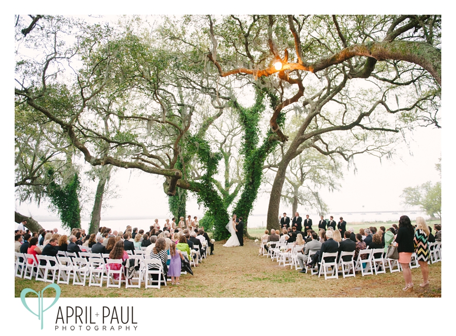 Bride and Groom ceremony under oak tree at The Old Place in Gautier, MS