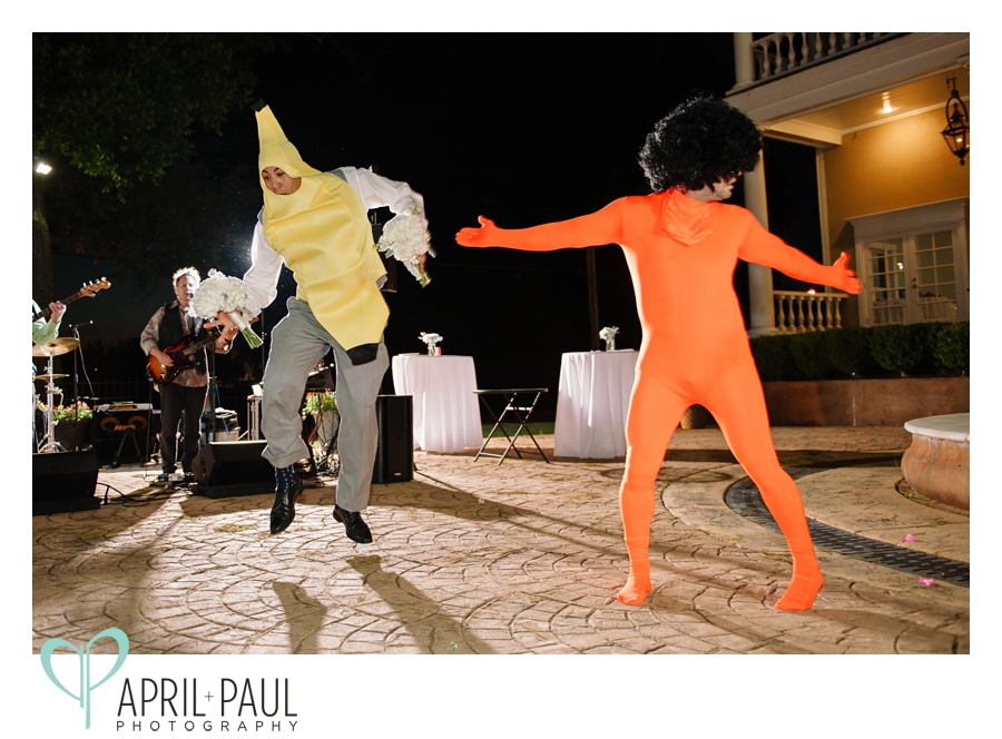 Reception with orange suit and banana suit dancers