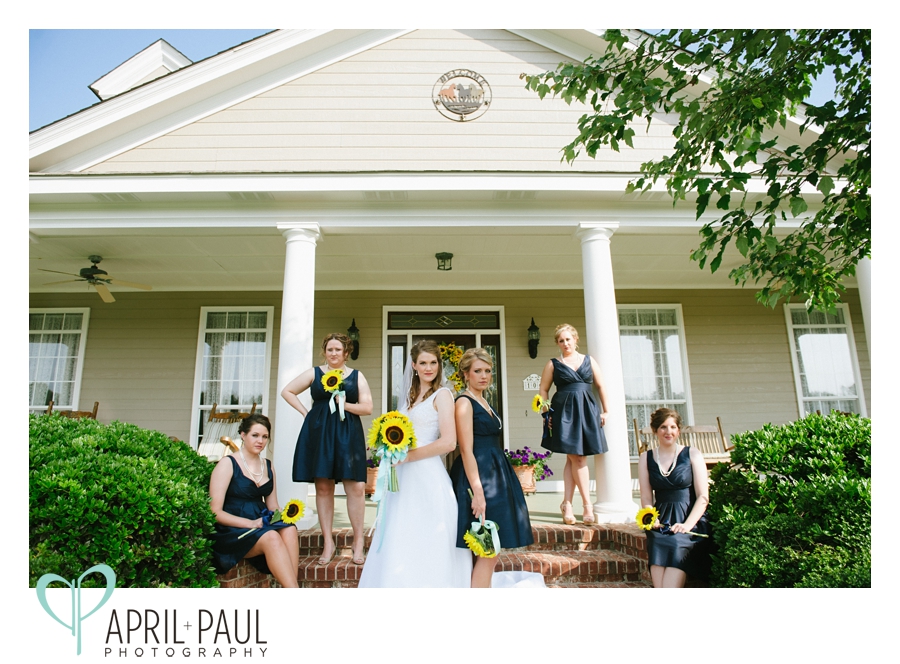 Bridal Party pose with sunflower bouquets