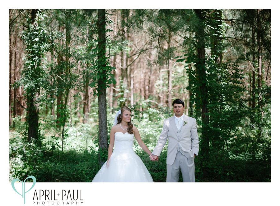 Bride and Groom in forrest in Noxapater, MS Wedding