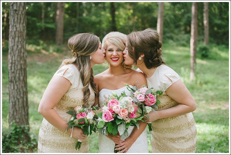 Bride with sisters at wedding